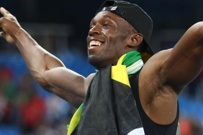 Bolt celebra su noveno oro olímpico, el de los 4x100 metros con Jamaica.-REUTERS / KAI PFAFFENBACH