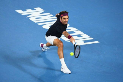 Federer, durante su sufrida victoria.-WILLIAM WEST / AFP