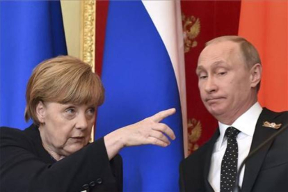 Los líderes de Rusia y Alemania han mantenido una rueda de prensa conjunta este domingo en el Kremlin.-Foto: POOL / AP