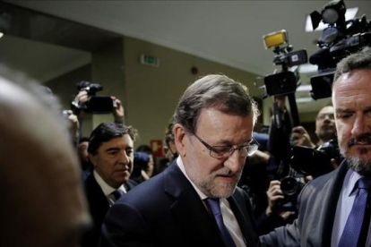 El presidente del Gobierno en funciones, Mariano Rajoy, al recoger su acta el en Congreso.-JOSÉ LUIS ROCA