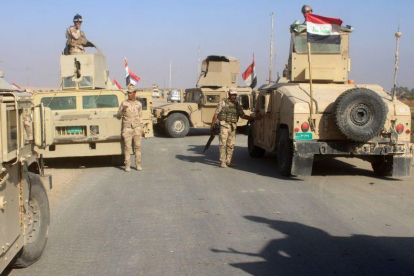 Las Fuerzas Armadas de Irak durante la operación militar que pretendía arrebatar a los yihadistas la ciudad de Rawa.-AFP / STRINGER (AFP)