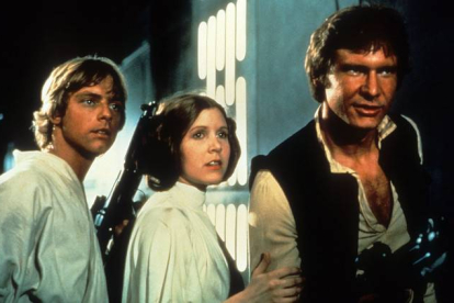 Han Solo (Harrison Ford) junto a los personajes de Leia y Luke Skywalwer, en la primera trilogía de 'La guerra de las galaxias'.-