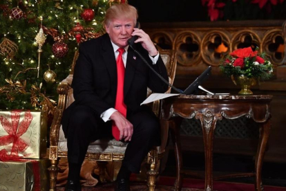 Donald Trump, en su residencia de Mar-a-Lago, en Florida, esta Navidad.-/ NICHOLAS KAMM (AFP)