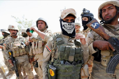 Soldados del Ejército iraquí en el centro de Faluya.-REUTERS / THAIER AL-SUDANI