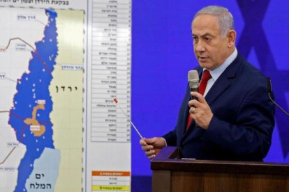 Binyamin Netanyahu durante la comparecencia de hoy.-AFP / MEHAHEM KAHANA
