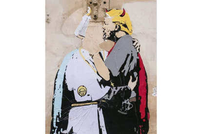 Vista de un grafiti en el que aparece el papa Francisco besando al presidente de Estados Unidos, Donald Trump (d) en un muro en el centro de Roma, a poca distancia de del Vaticano, Italia hoy 11 de mayo de 2017.-EFE