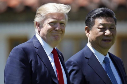 Los presidentes de Estados Unidos y China, Donald Trump y Xi Jinping, en la cumbre del pasado mes de abril en Florida.-AP / ALEX BRAND