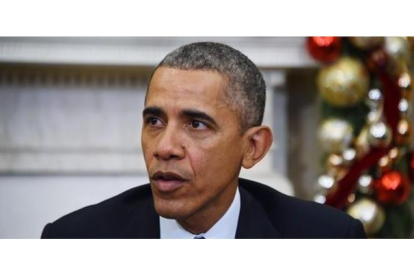 Barack Obama habla sobre el uso de las armas de fuego desde el Despacho Oval.-AFP / JIM WATSON