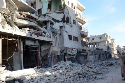Edificios destrozados en una calle de Al Bab, en el noroeste de Siria, el 23 de febrero.-NAZEER AL-KHATIB