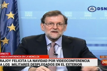 Imagen de la intervención de Rajoy, este sábado.-