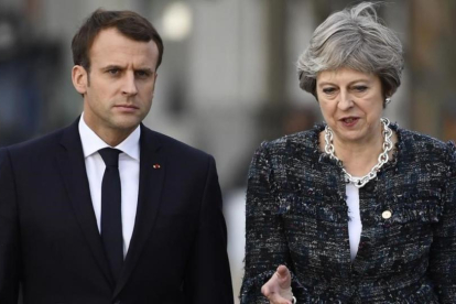El presidente de Francia, Emmanuel Macron (izquierda), y la primera ministra británica, Theresa May.-AFP / JONATHAN NACKSTRAND