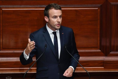 Macron, durante su discurso en Versalles.-ERIC FEFERBERG / AFP