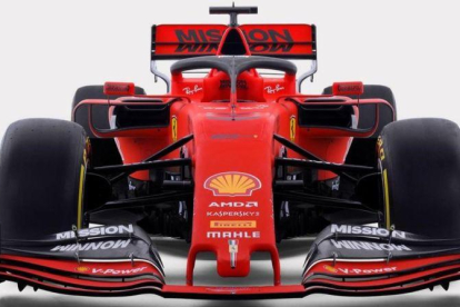 El nuevo monoplaza de Ferrari, con los nuevos colores, que conducirán Sebastian Vettel y Charles Leclerc.-EFE