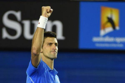 Djokovic, tras derrotar a Raonic, en Melbourne.-Foto: MANAN VATSYAYANA / AFP