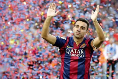 Xavi, el día de su despedida del Camp Nou, en mayo pasado.-REUTERS / GUSTAU NACARINO