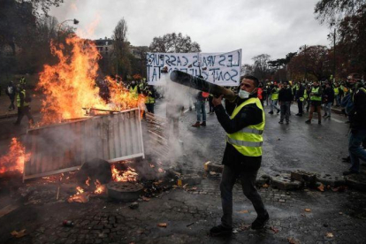 Protestas de los chalecos amarillos por las calles de París.-EASSA / AFP