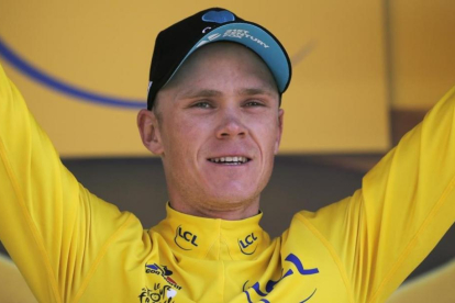 Chris Froome, con el jersey amarillo del Tour.-AFP