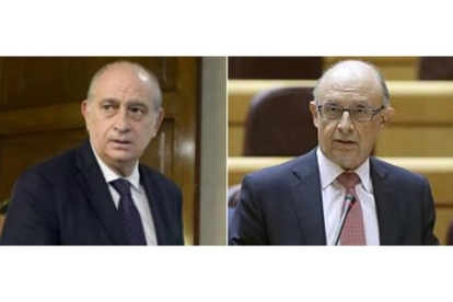 Los ministros del Interior, Jorge Fernández Díaz, y de Hacienda, Cristóbal Montoro.-