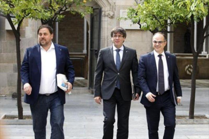 Junqueras, Puigdemont y Turull, el 1 de agosto.-RICARD CUGAT