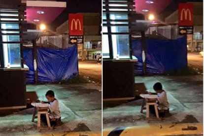 El pequeño de ocho años estudia todas las noches aprovechando la luz del restaurante de comida rápida porque su casa fué destruida por un incendio-Foto:   FACEBOOK / JOYCE GILOS TORREFRANCA