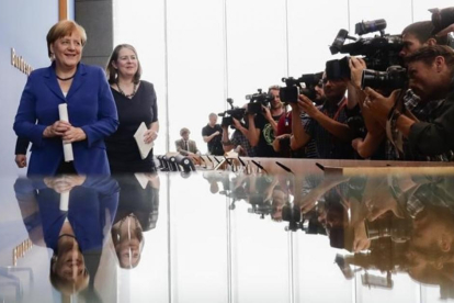 La cancillera Angela Merkel, tras la comparecencia en Berlín.-AP / MARKUS SCHREIBER