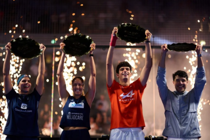 Coello y Tapia levantan su trofeo en Roma.