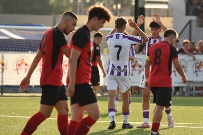 Jugadores del Promesas celebran uno de los goles