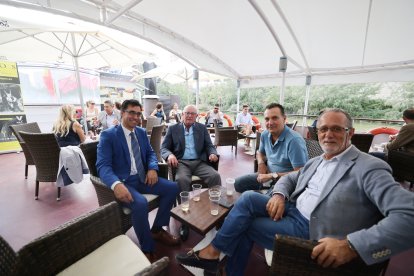 Ciriaco Rodríguez, del Banco Santander, con José María Conde,  Archidiócesis de Valladolid, el abogado Ricardo Gutiérrez e Ignacio Ramos en la caseta de Ferias de EL MUNDO./ PHOTOGENIC