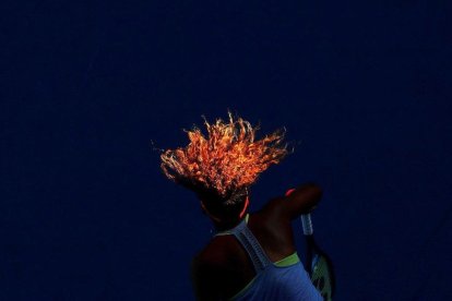 Partido entre Naomi Osaka y Simona Halep en el Abierto de Australia. / DAVID GRAY (REUTERS)
