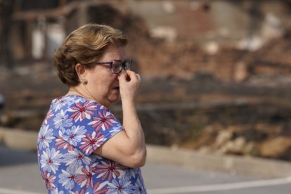 Vecinos que fueron desalojados de Las Médulas y Carucedo (León) por el incendio regresan a sus casas, algunas arrasadas por las llamas.