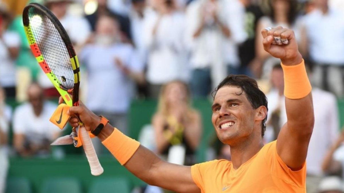 Nadal celebra su triunfo-YANN COATSALIOU