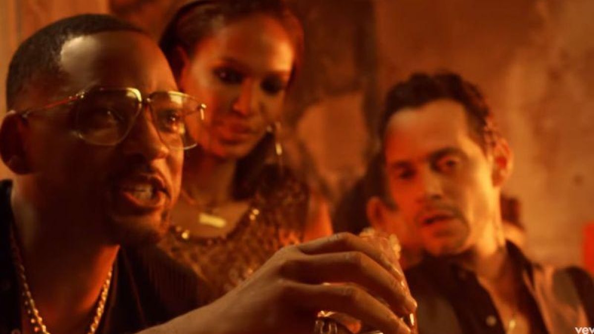 Will Smith y Marc Anthony, en el clip de Está rico.-YOUTUBE