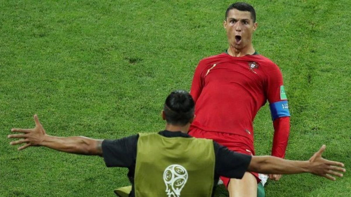 Cristiano Ronaldo celebrando uno de los goles ante España.-LUCY NICHOLSON