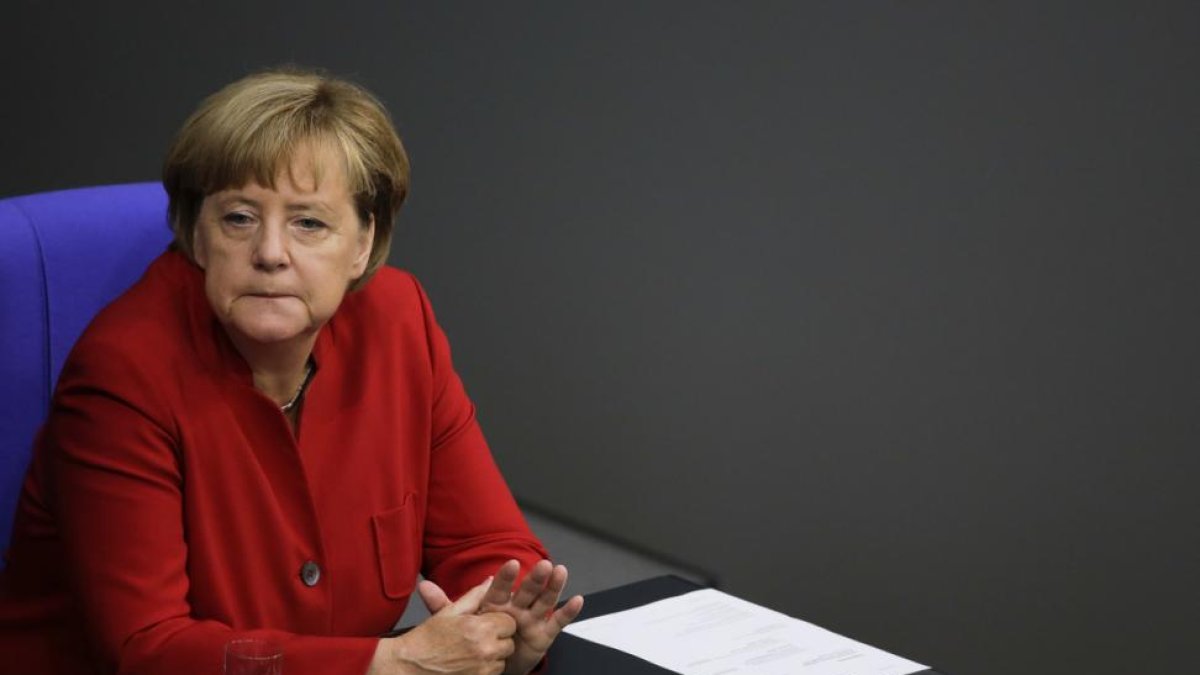 Angela Merkel en el Bundestag.-MARKUS SCHREIBER / AP
