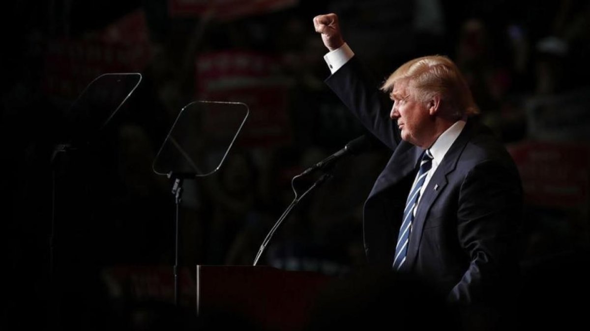 Donald Trump en un acto de campaña electoral en Wisconsin.-AFP / CHIP SOMODEVILLA