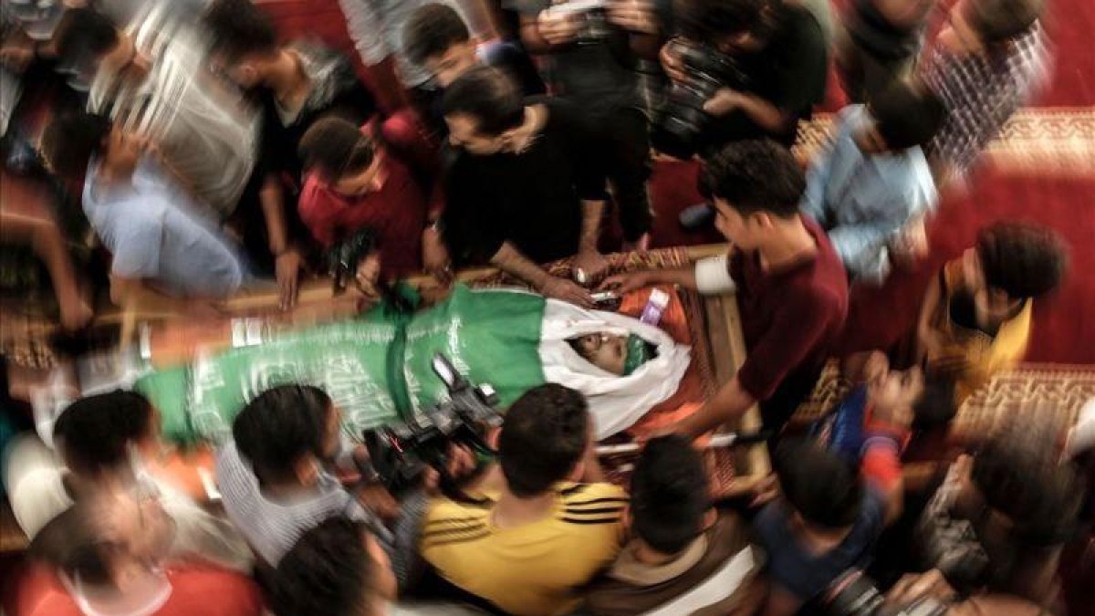 Entierro de uno de los fallecidos en Gaza.-AFP / MAHMUD HAMS