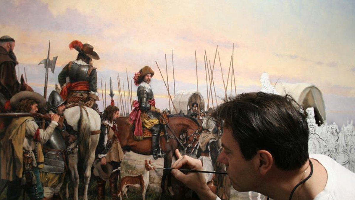 Auguso Ferrer-Dalmau trabaja en uno de sus cuadros de temática militar. E.M.