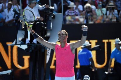 Nadal, tras imponerse en su estreno en el Abierto de Australia.-AFP / JOHN DONEGAN
