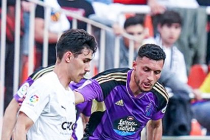 Amallah, con Almeida en Mestalla.