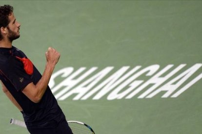 Feli López celebra su triunfo en Shanghái.-Foto: AFP / JOHANNES EISELE