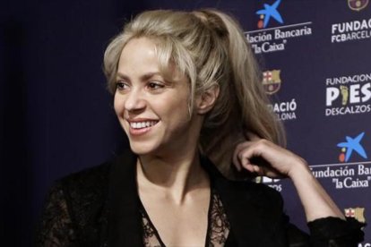 Shakira, en una rueda de prensa en el Camp Nou, en marzo del año pasado.-AP / MANU FERNÁNDEZ