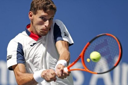 Carreño devuelve un revés, durante su partio contra Schwartzman-JASON DECROW (AP)