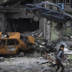 Una calle en ruinas de la ciudad iraquí de Mosul.-AP / FELIPE DANA