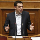 Tsipras en su primer discurso en el parlamento griego como primer ministro.-Foto: REUTERS