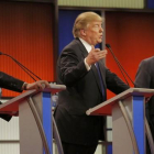 Marco Rubio, Donald Trump y Ted Cruz, en un momento del debate republicano, moderado por la Fox en Detroit.-REUTERS / JIM YOUNG
