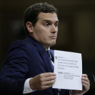 El presidente de Ciudadanos, Albert Rivera, durante su intervención en la segunda jornada del debate de la investidura del candidato del PP, Mariano Rajoy, que se celebra en el Congreso de los Diputados.-EFE/Emilio Naranjo