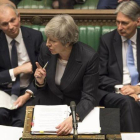 La primera ministra británica, Theresa May, interviene en la Cámara de los Comunes.-MARK DUFFY (AP)