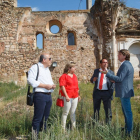 El presidente de la Diputación de Soria, Luis Rey (2D); el alcalde de la ciudad, Carlos Martínez (D) y la procuradora Esther Pérez, visitan el antiguo edificio del Colegio Universitario de Soria.-Ical