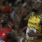 Bolt derrota a Gatlin en los 100 metros de los Mundiales de Pekín 2015.-AFP / ADRIAN DENNIS