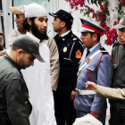 Uno de los condenados, Abdessamad Al Joud, llegando al tribunal del juicio.-MOHAMED SIALI (EFE)